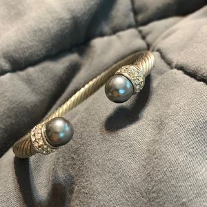 Super stunning twisted bracelet.  Very heavy. No scratches or marks.